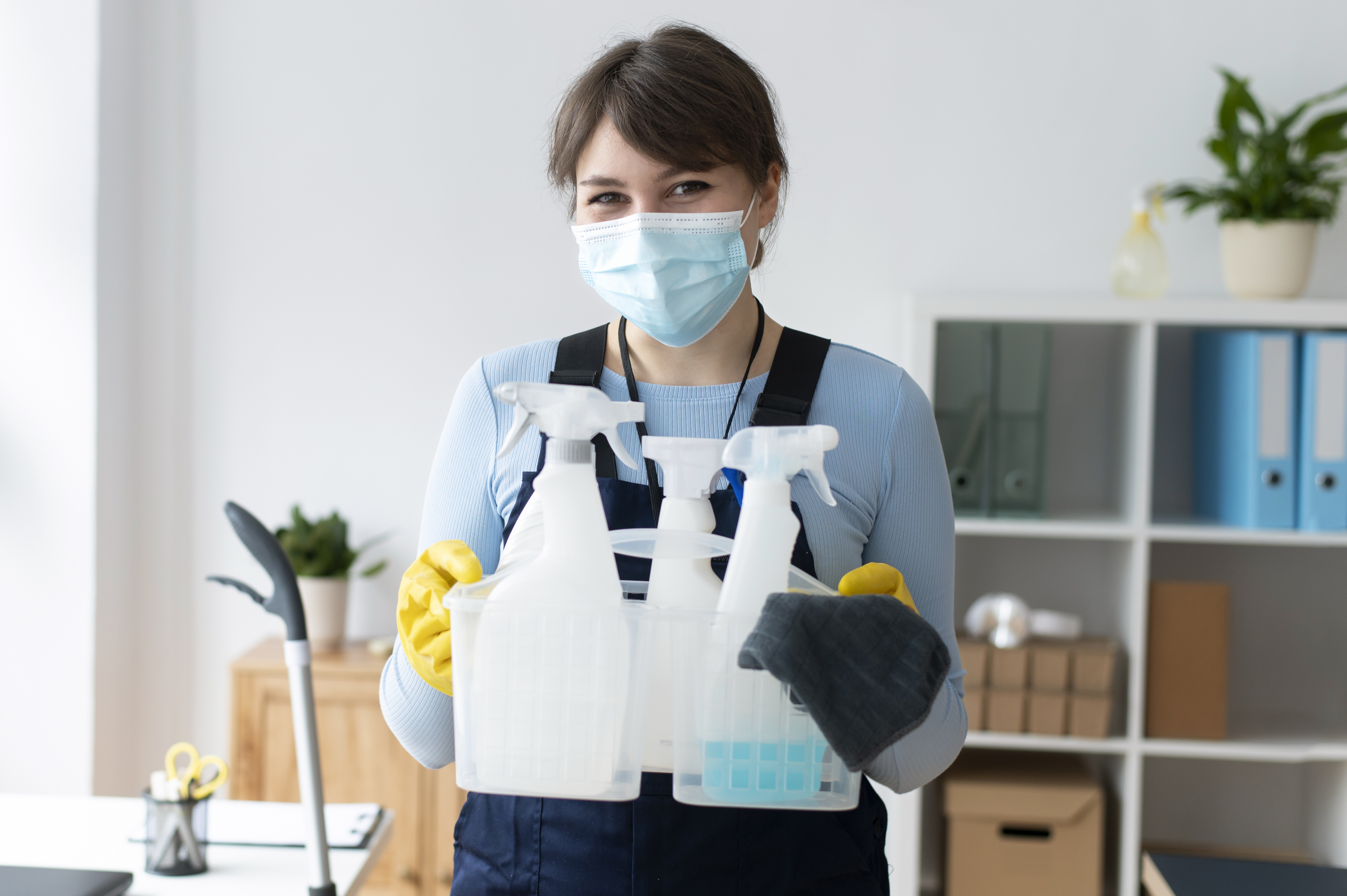 person-taking-care-office-cleaning